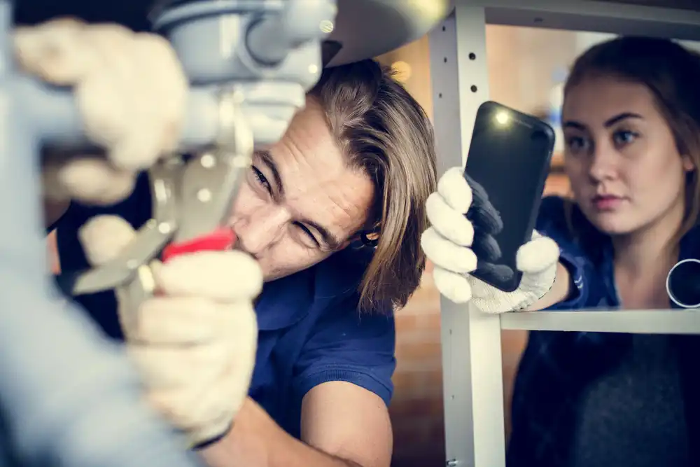 Chapman Plumbing technician completing an installation